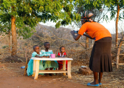 USING PHOTOVOICE TO ASSESS IMPACTS OF BEHAVIOR CHANGE NUTRITION ACTIVITIES IN KENYA